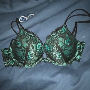 Vs black lace over teal bra